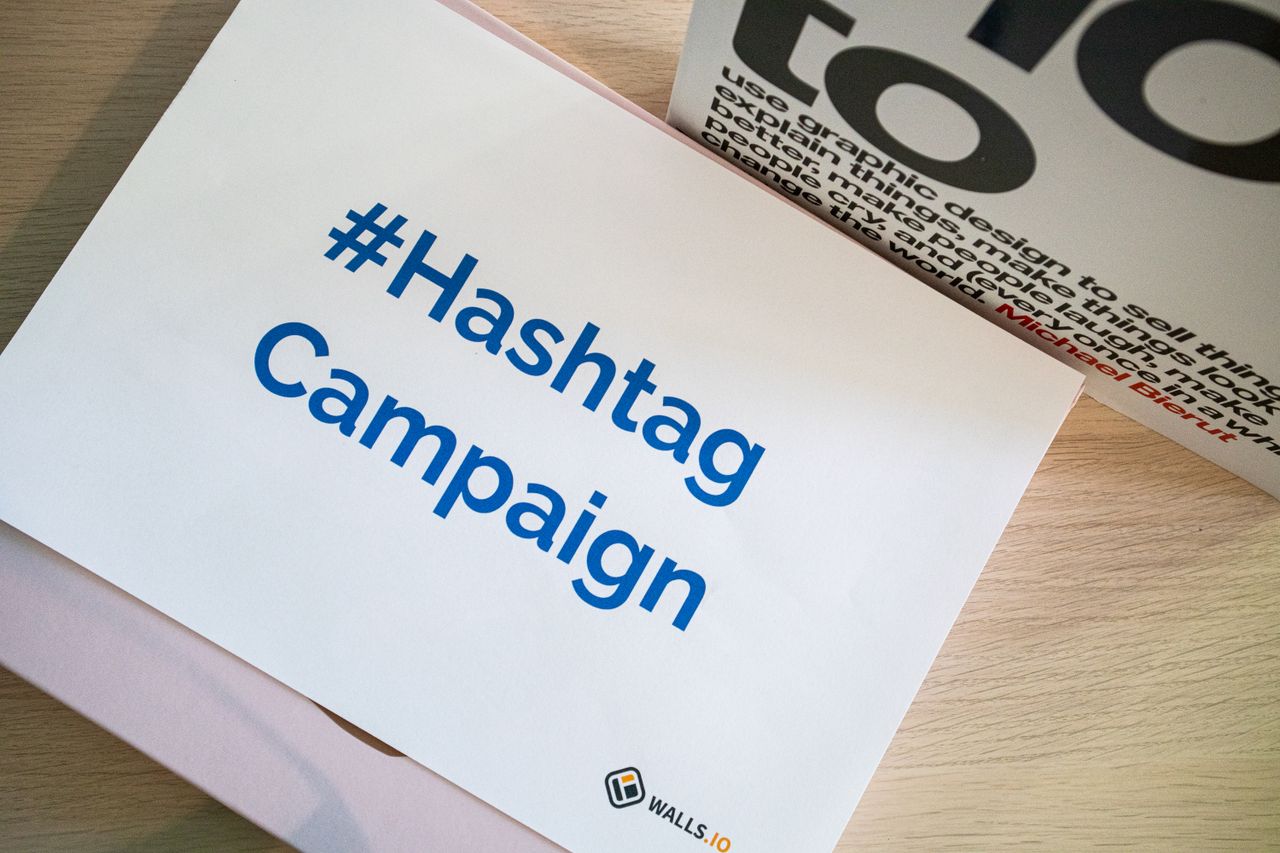 why-choose-us A concept image showing a hashtag campaign on paper for marketing strategy planning.